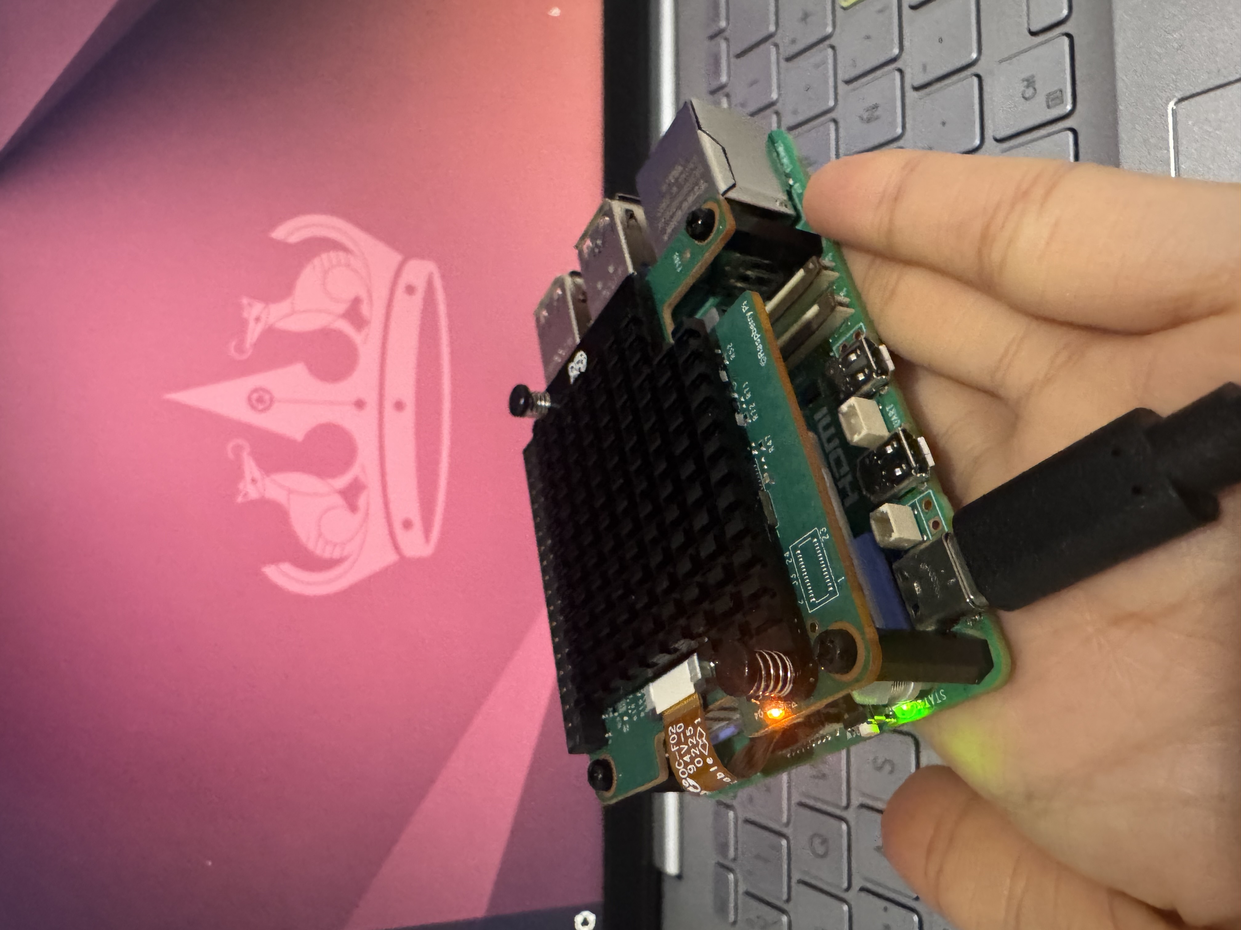 Assembled and powered on — Pi 5 + AI HAT+ 2 running